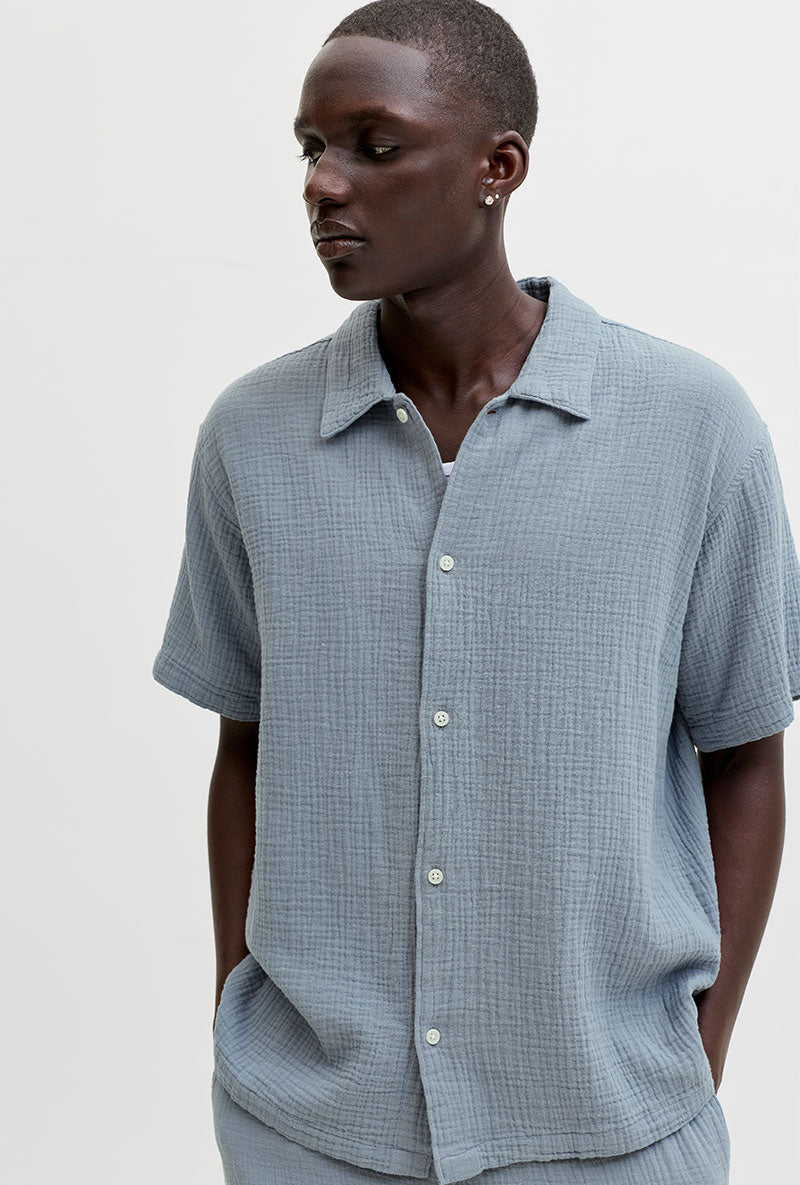 Front image of a model wearing Nantucket double cloth ss shirt in blue, by brand Jack&jones