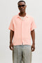 Front image of a model wearing Nantucket double cloth ss shirt in peach, by brand Jack&jones