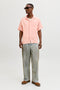 Front image of a model wearing the Nantucket double cloth ss shirt in peach, by brand Jack&jones