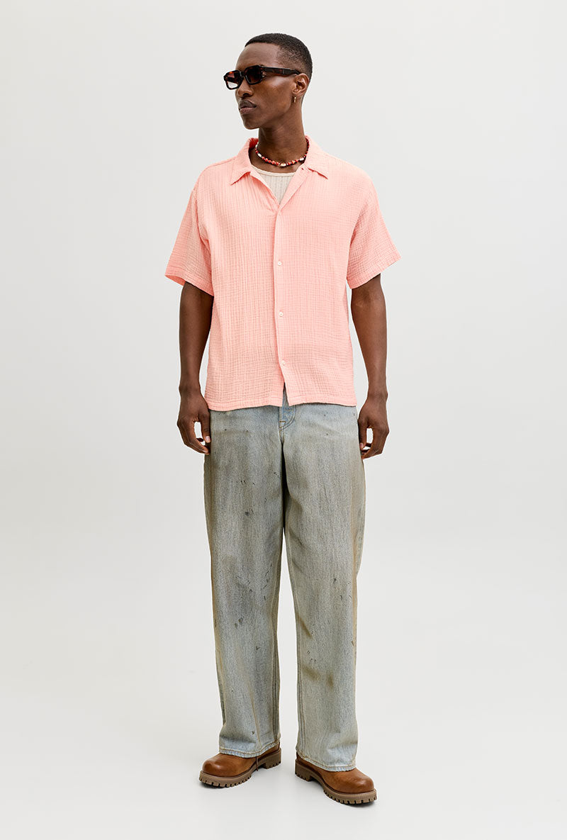 Front image of a model wearing Nantucket double cloth ss shirt in peach, by brand Jack&jones
