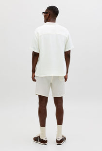 Back image of a model wearing the Nantucket double cloth ss shirt in off white, by brand Jack&jones