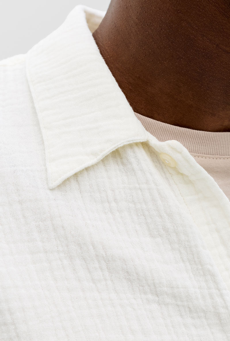 Front detail image of a model wearing Nantucket double cloth ss shirt in off white, by brand Jack&jones
