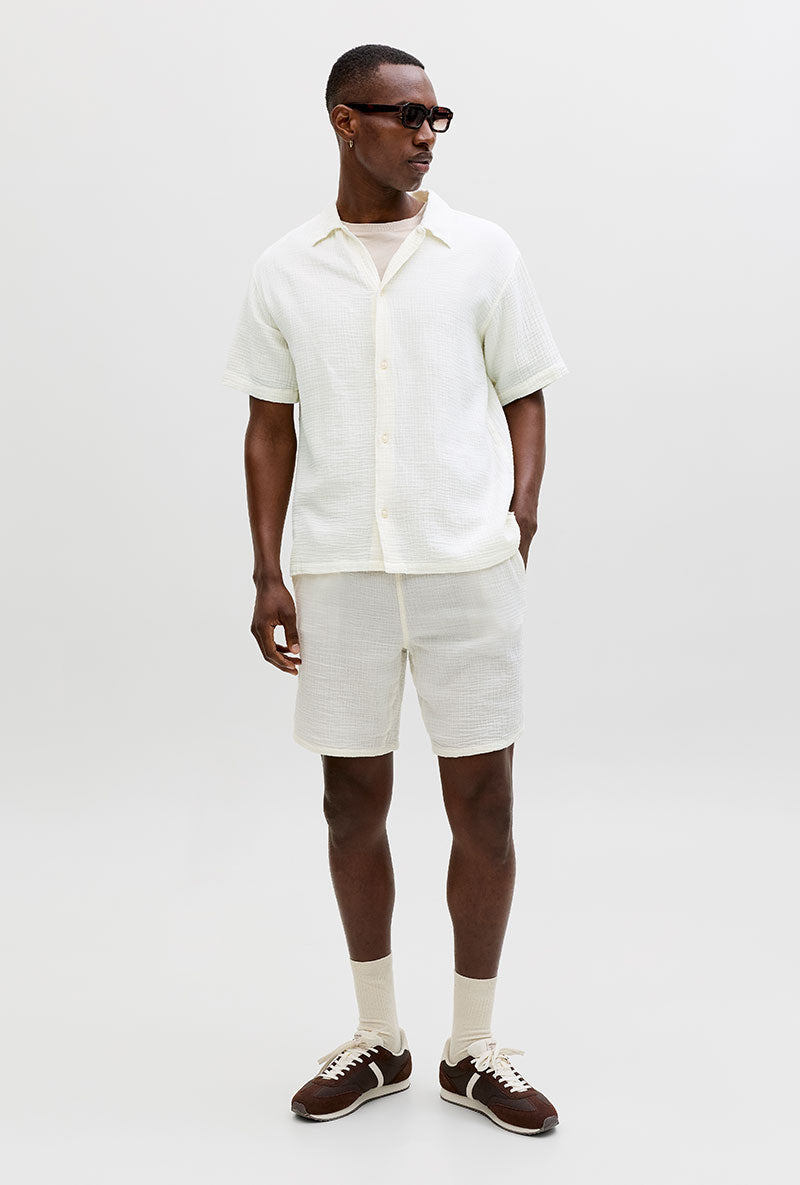 Front image of a model wearing Nantucket double cloth ss shirt in off white, by brand Jack&jones