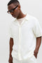 Front image of a model wearing the Nantucket double cloth ss shirt in off white, by brand Jack&jones