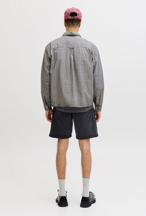 Back image of a model wearing the Rick jj fox denim shorts in black, by brand Jack&jones
