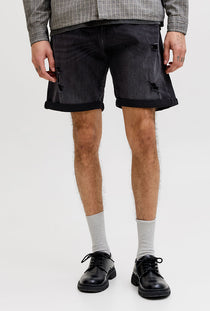 Front image of a model wearing the Rick jj fox denim shorts in black, by brand Jack&jones