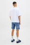Back image of a model wearing the Rick jj fox denim shorts in light denim, by brand Jack&jones