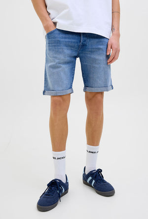 Front image of a model wearing the Rick jj fox denim shorts in light denim, by brand Jack&jones