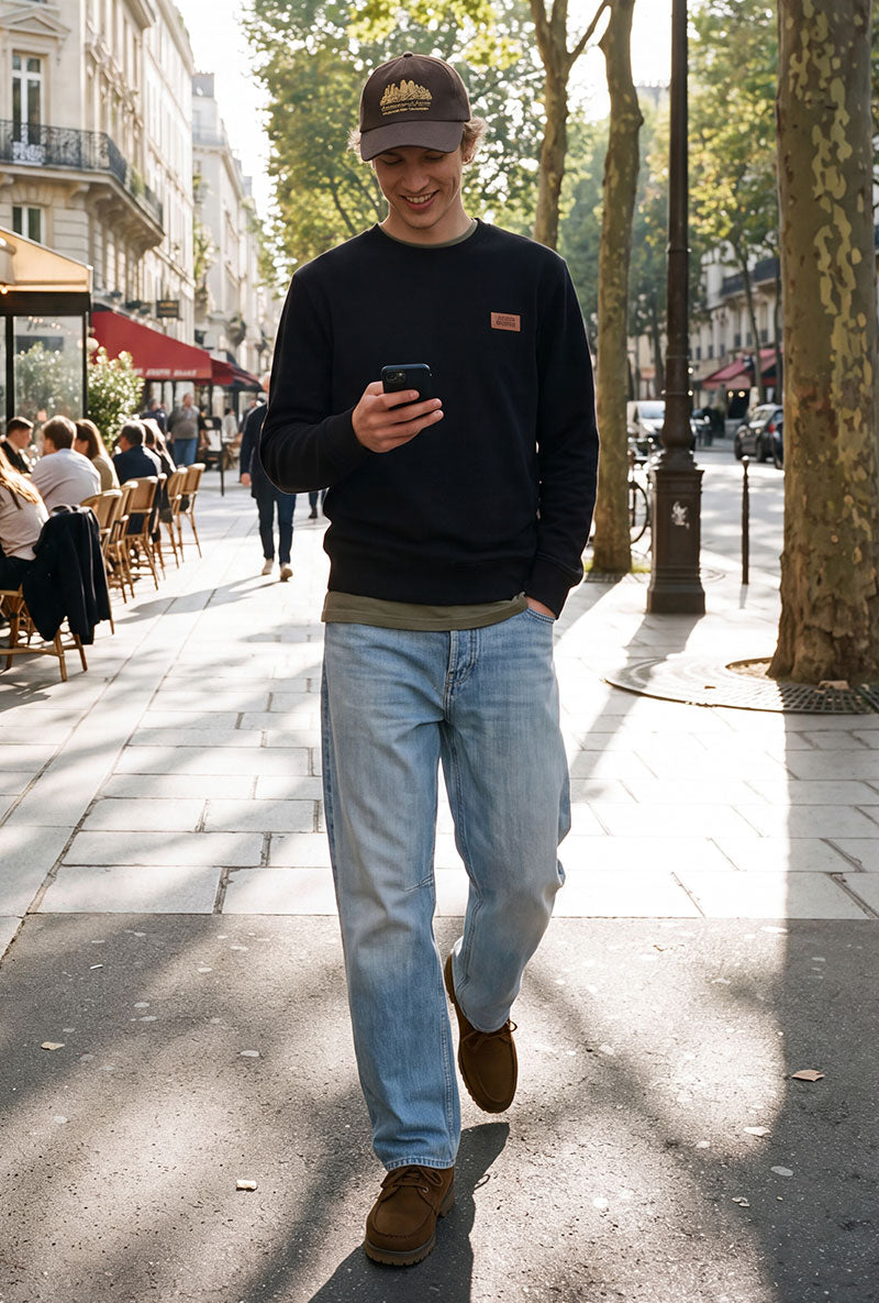 Front image of a model wearing Rush sweat crew neck sweatshirt in black, by brand Jack&jones