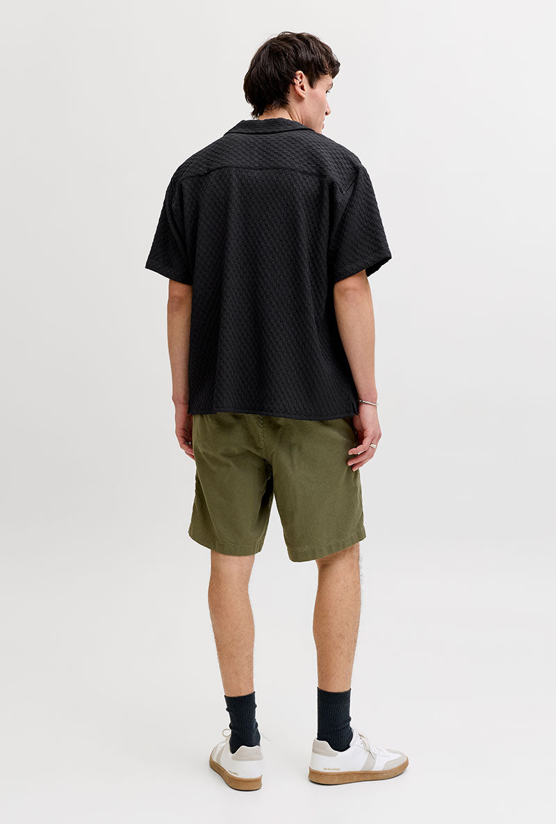 Back image of a model wearing Sean resort shirt in black, by brand Jack&jones