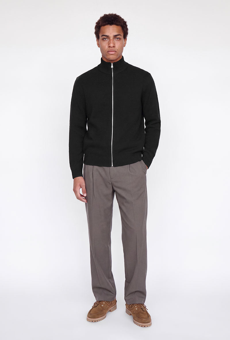 Front image of a model wearing Soho ollie high neck zip knit in black, by brand Jack&jones