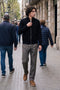 Front image of a model wearing the Soho ollie high neck zip knit in black, by brand Jack&jones