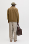 Back image of a model wearing the Jack and jones stevan dylan jogger in stone, by brand Jack&jones