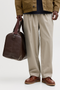 Front image of a model wearing the Jack and jones stevan dylan jogger in stone, by brand Jack&jones