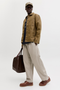 Front image of a model wearing the Jack and jones stevan dylan jogger in stone, by brand Jack&jones