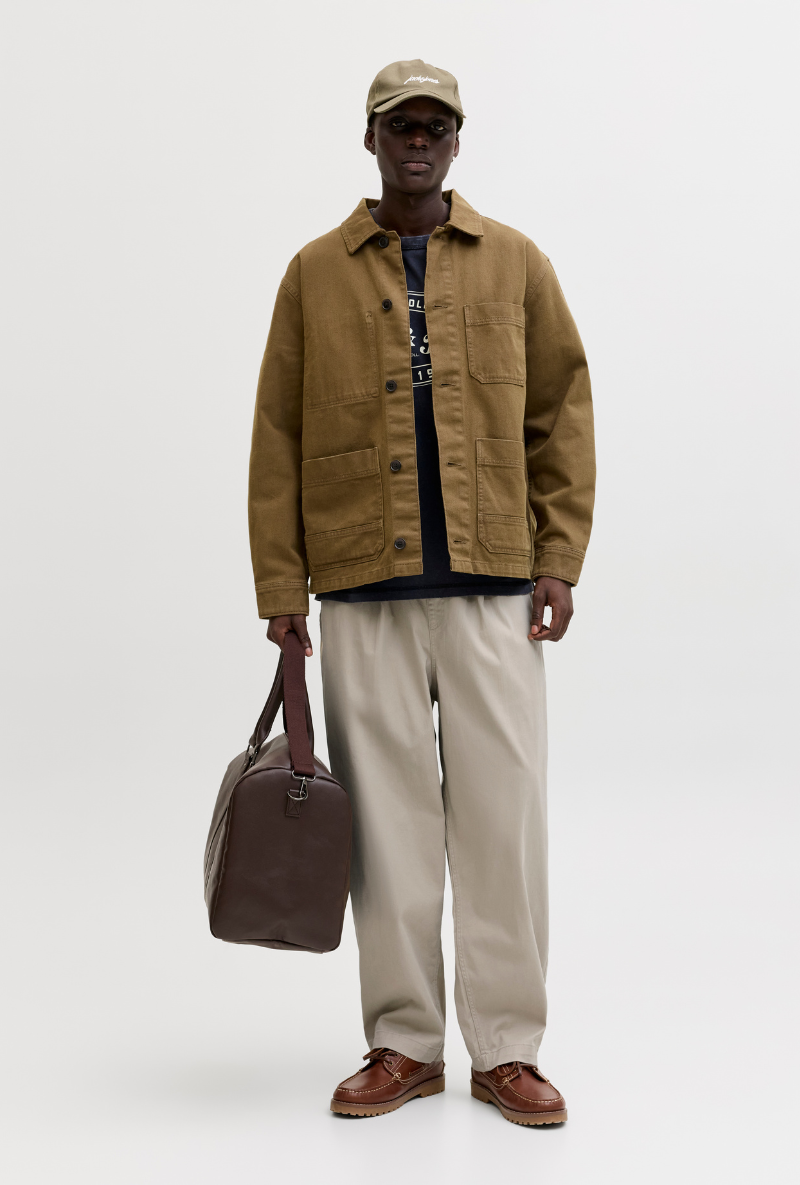 Front image of a model wearing Jack and jones stevan dylan jogger in stone, by brand Jack&jones