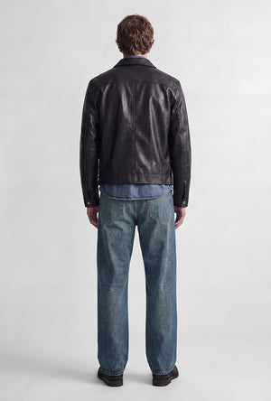 Back image of a model wearing the Ted jj cooper am559 jeans in denim, by brand Jack&jones