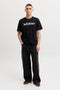 Front image of a model wearing the Tom tee ss crew neck in black, by brand Jack&jones