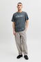 Front image of a model wearing the Tom tee ss crew neck in charcoal, by brand Jack&jones