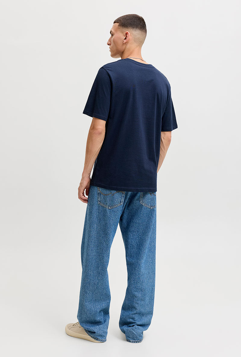 Back image of a model wearing Tom tee ss crew neck in navy, by brand Jack&jones