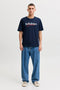 Front image of a model wearing the Tom tee ss crew neck in navy, by brand Jack&jones