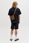Back image of a model wearing the Tyson resort shirt in black, by brand Jack&jones