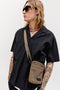 Front image of a model wearing the Tyson resort shirt in black, by brand Jack&jones