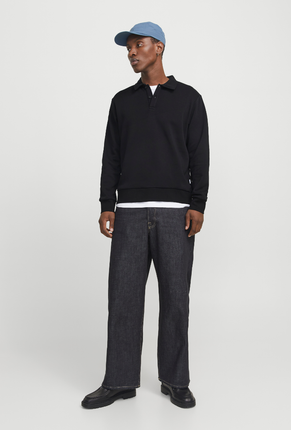 Front image of a model wearing Jack and jones bradley sweat polo in black, by brand Jack&jones