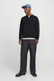 Front image of a model wearing Jack and jones bradley sweat polo in black, by brand Jack&jones