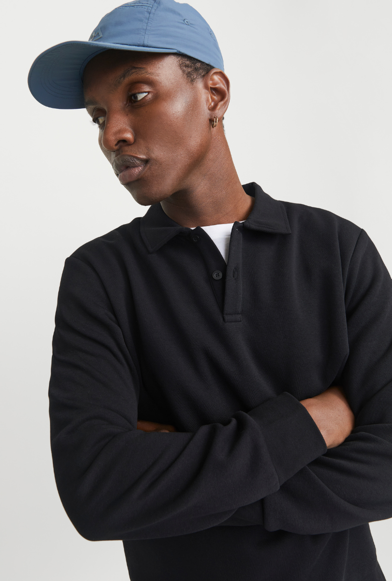 Front image of a model wearing Jack and jones bradley sweat polo in black, by brand Jack&jones