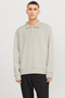 Front image of a model wearing the Jack and jones bradley sweat polo in stone, by brand Jack&jones