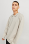 Front image of a model wearing the Jack and jones bradley sweat polo in stone, by brand Jack&jones