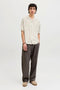 Front image of a model wearing the Jeff resort stripe shirt in olive, by brand Jack&jones