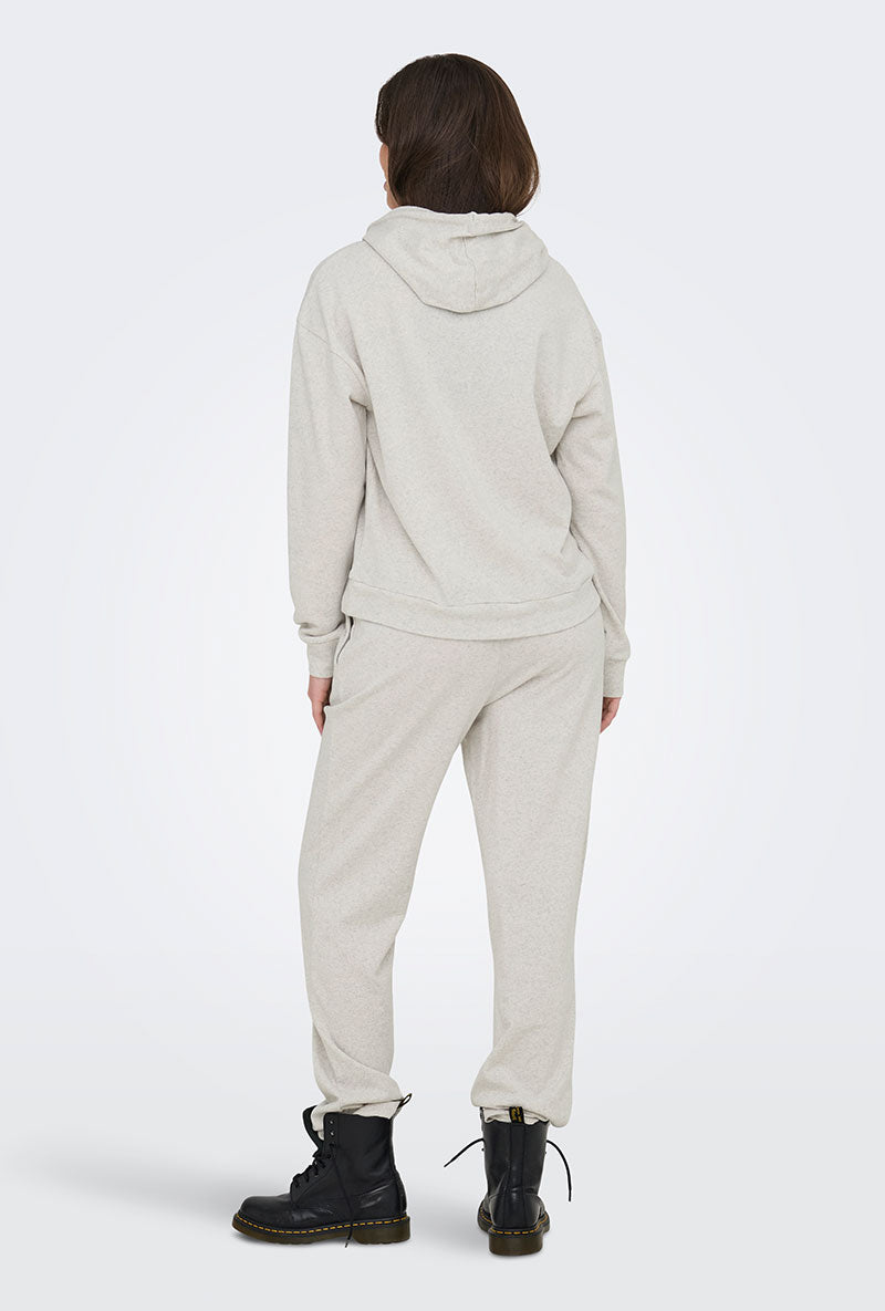 Back image of a model wearing Amalfi life ls hood in oat, by brand Jacqueline de yong