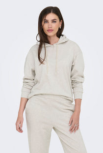 Front image of a model wearing the Amalfi life ls hood in oat, by brand Jacqueline de yong