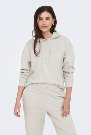 Front image of a model wearing the Amalfi life ls hood in oat, by brand Jacqueline de yong