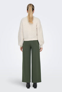 Back image of a model wearing the Eira life oneck cardigan in off white, by brand Jacqueline de yong