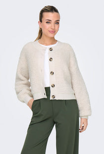 Front image of a model wearing the Eira life oneck cardigan in off white, by brand Jacqueline de yong