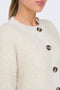 Front image of a model wearing the Eira life oneck cardigan in off white, by brand Jacqueline de yong