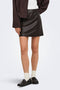 Front image of a model wearing Ella pu mini skirt in black, by brand Jacqueline de yong