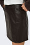 Front image of a model wearing the Ella pu mini skirt in black, by brand Jacqueline de yong