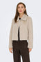 Front image of a model wearing Macy faux fur jacket in beige, by brand Jacqueline de yong
