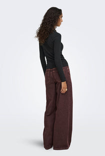 Back image of a model wearing the Lucky l/s oneck top in black, by brand Jacqueline de yong