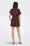 Back image of a model wearing the Mille mw shorts in brown, by brand Jacqueline de yong