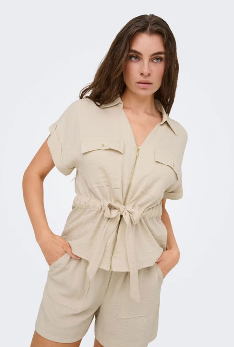 Front image of a model wearing Mille ss zip shirt in beige, by brand Jacqueline de yong
