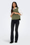 Front image of a model wearing the Simina teddy waistcoat in olive, by brand Jacqueline de yong