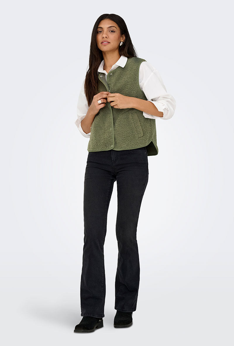 Front image of a model wearing Simina teddy waistcoat in olive, by brand Jacqueline de yong