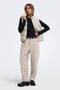 Front image of a model wearing the Power short waistcoat in beige, by brand Jacqueline de yong