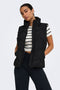 Front image of a model wearing Power short waistcoat in black, by brand Jacqueline de yong