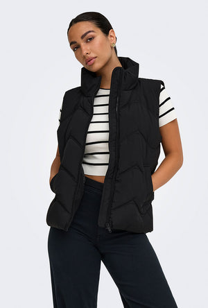 Front image of a model wearing the Power short waistcoat in black, by brand Jacqueline de yong
